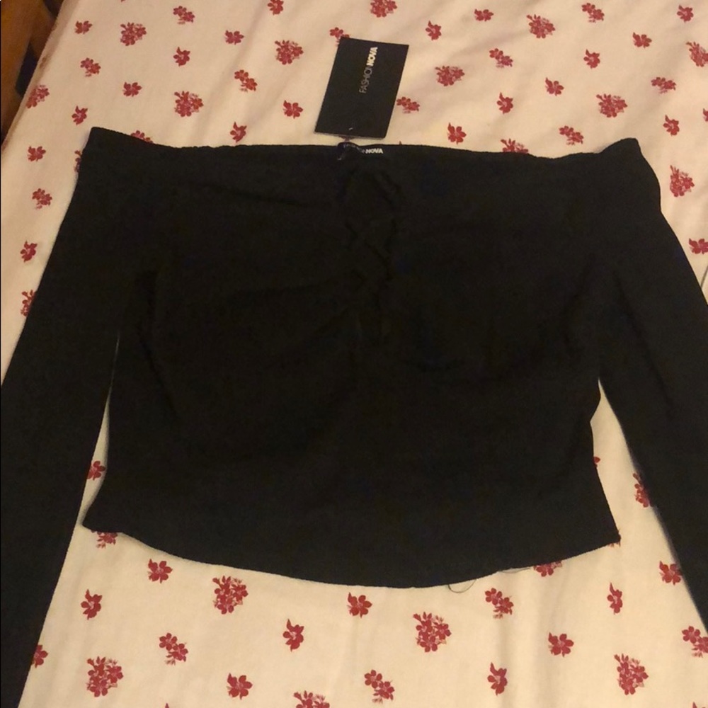 Off the shoulder long sleeve top; lace up detail